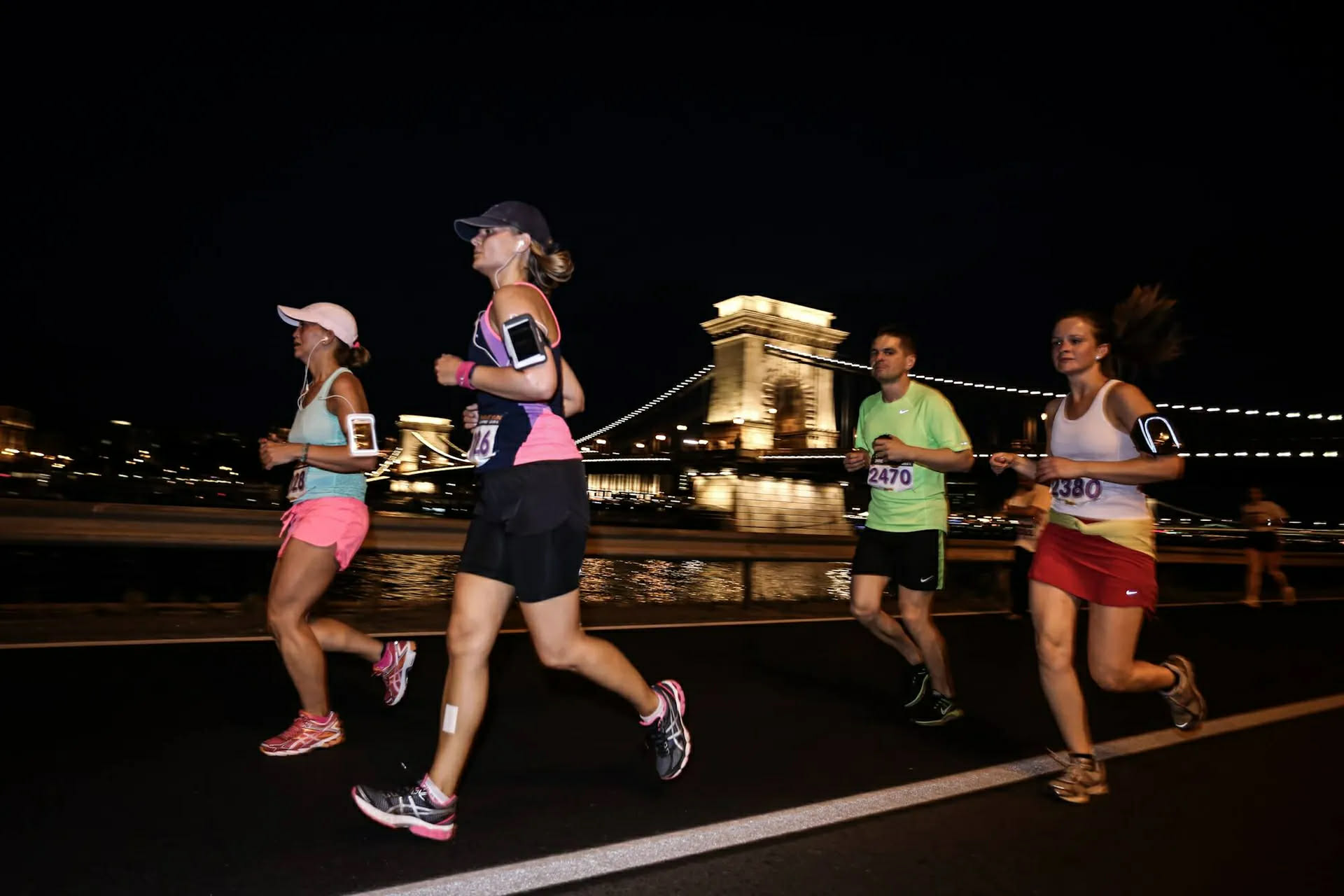 Runners training along the Danube at sunrise